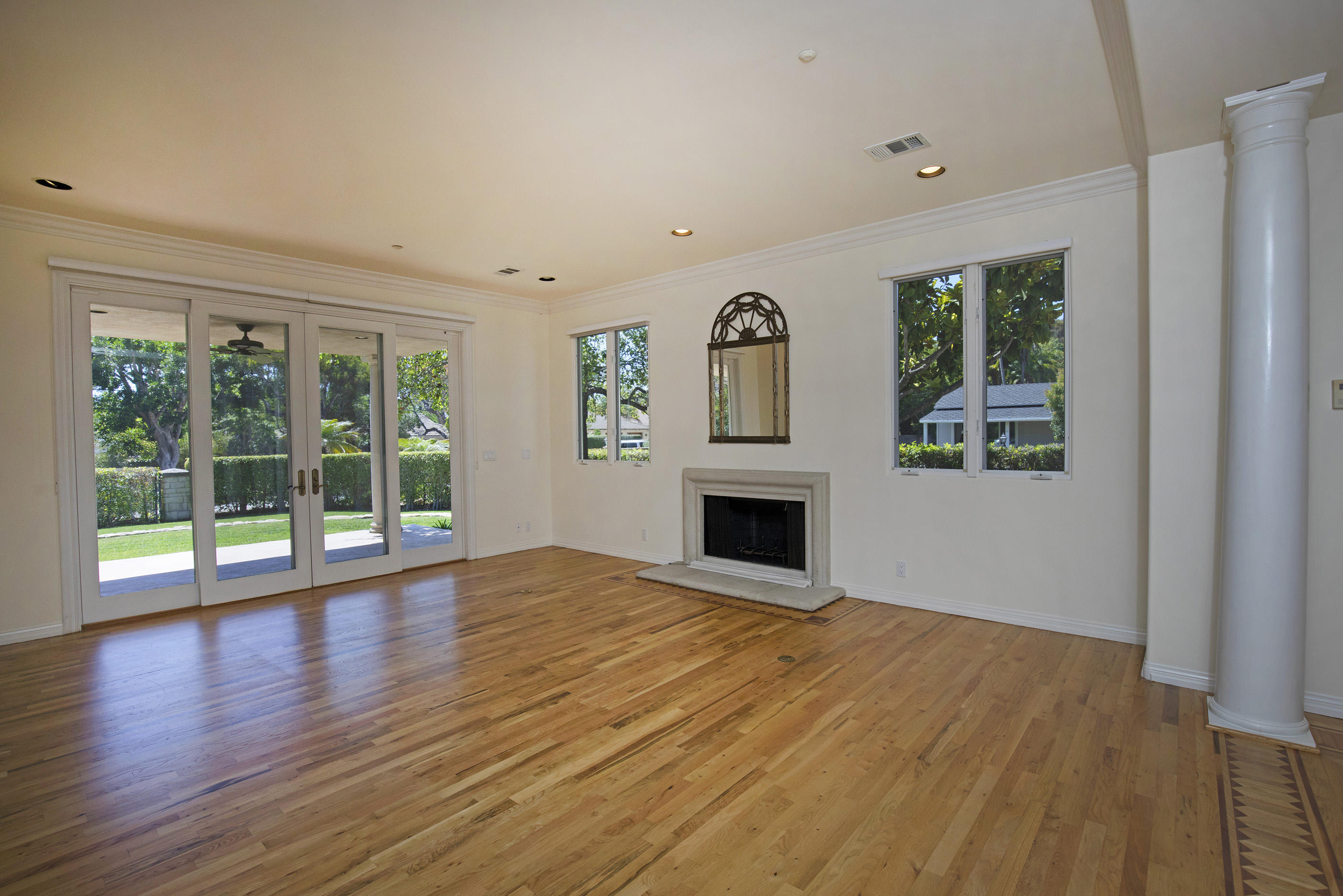 1138 Hill Road Montecito, CA 93108 - Photo 6 of 15 a view of empty room with wooden floor and fireplace