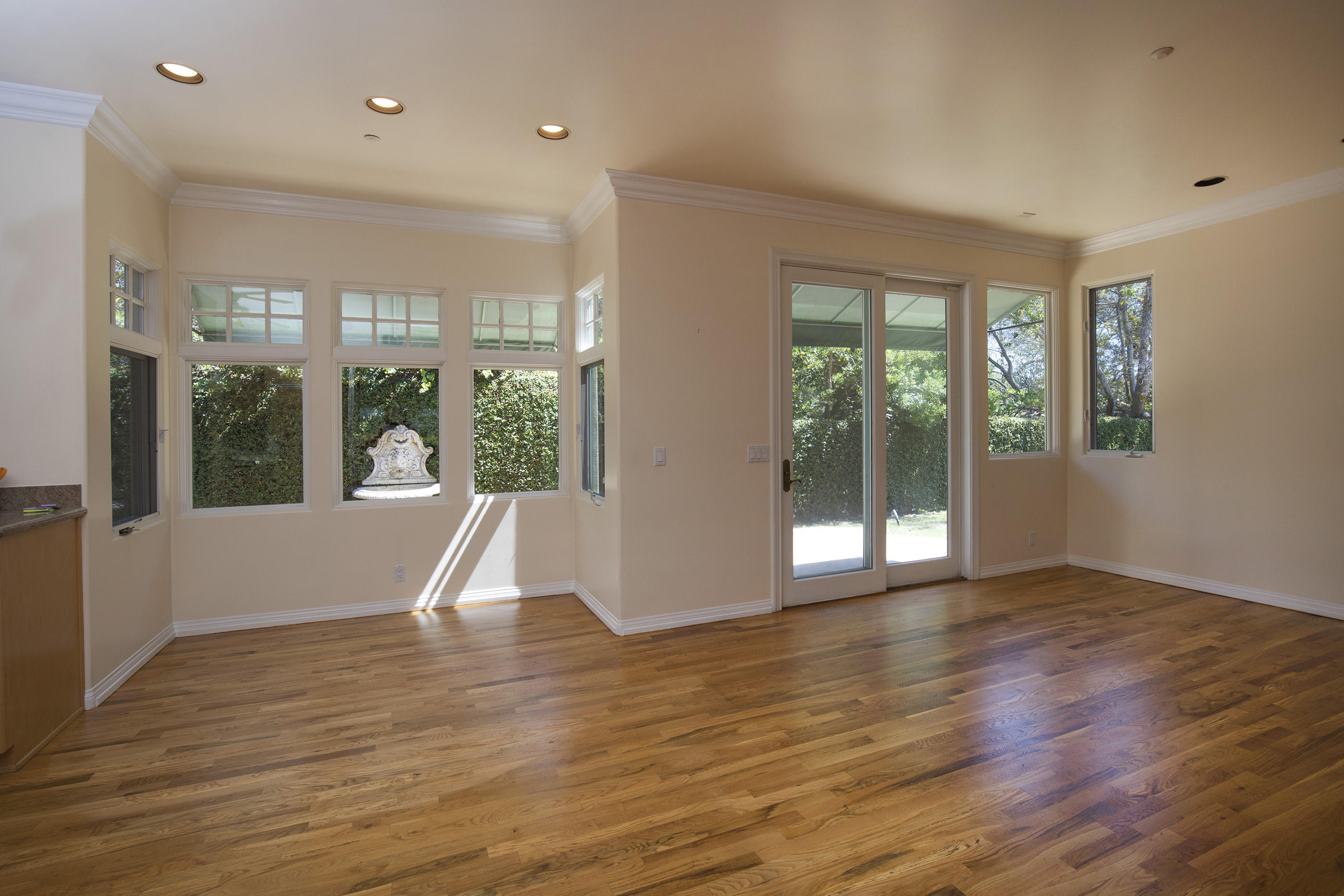 1138 Hill Road Montecito, CA 93108 - Photo 8 of 15 a view of an empty room with wooden floor and a window