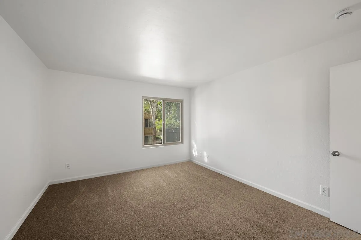 6006 Rancho Mission Road San Diego, CA 92108 - Photo 22 of 32 an empty room with a window