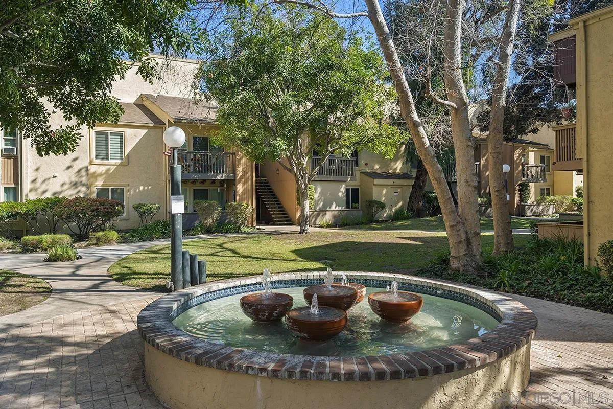 6006 Rancho Mission Road San Diego, CA 92108 - Photo 24 of 32 a view of a fountain in the backyard of house