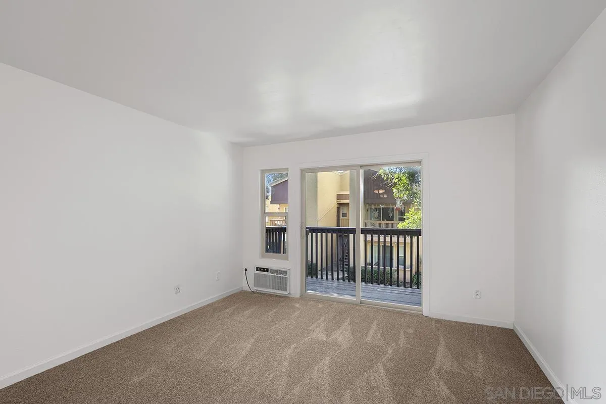 6006 Rancho Mission Road San Diego, CA 92108 - Photo 4 of 32 an empty room with windows