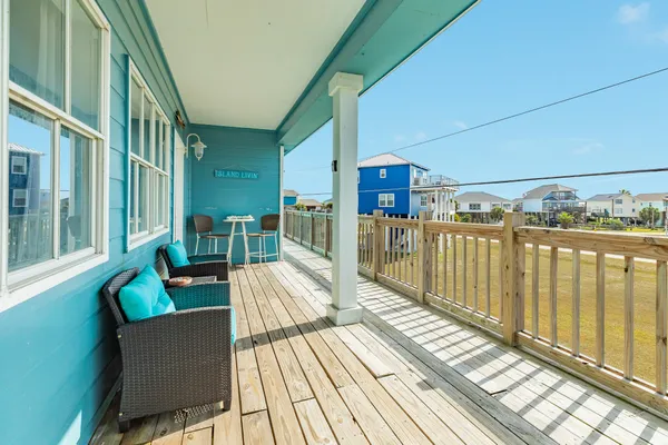 a view of balcony with furniture