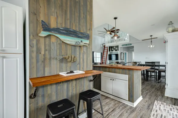 a kitchen with stainless steel appliances a white sink stove and refrigerator