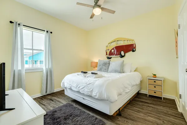 a bedroom with a bed and window