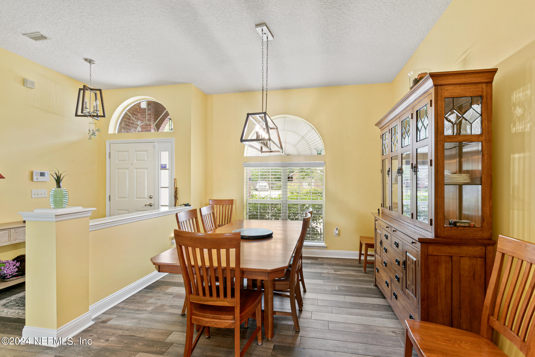 1658 Lockend Road Jacksonville, FL 32221 - Photo 13 of 54 a view of a dining room with furniture window and wooden floor