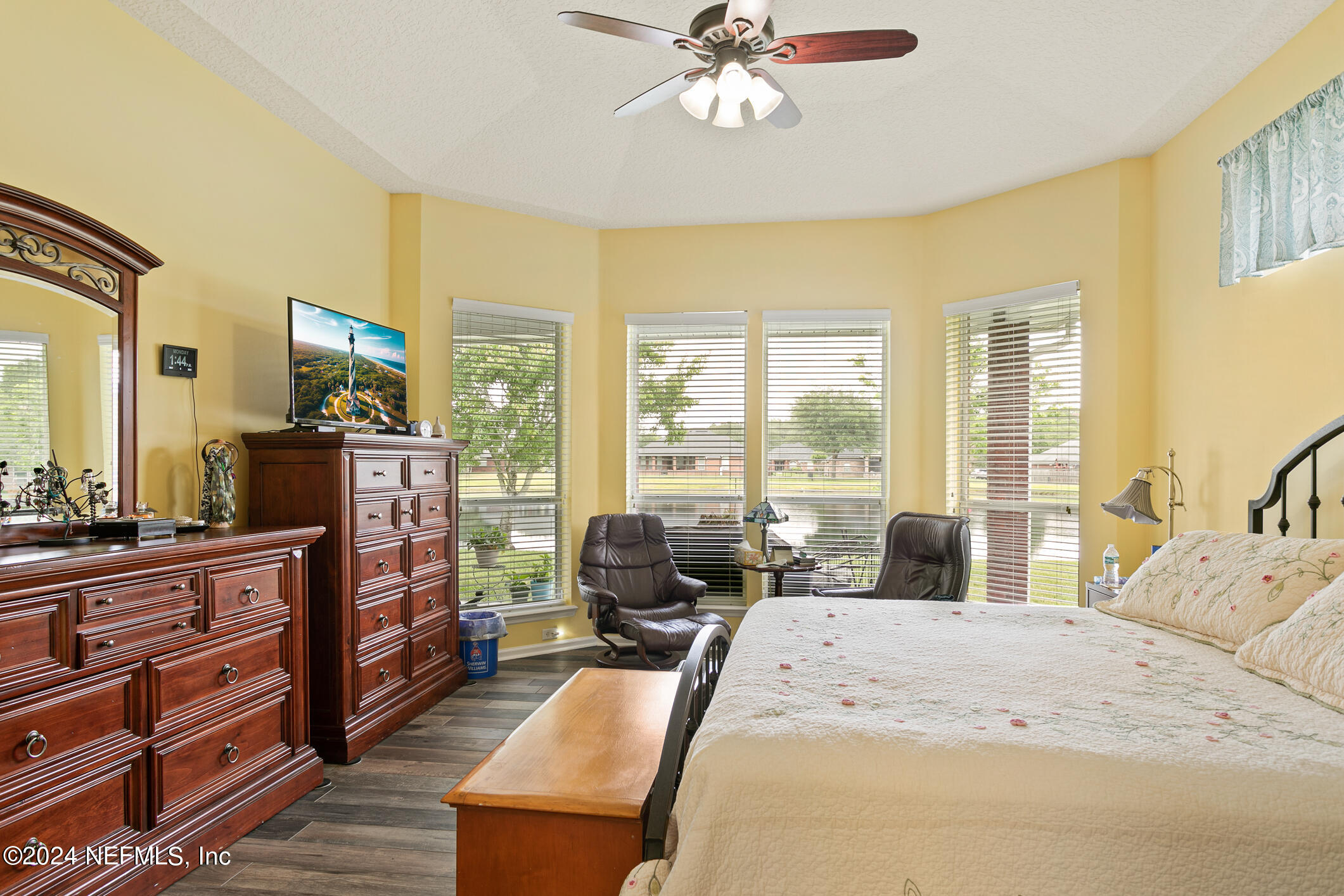 1658 Lockend Road Jacksonville, FL 32221 - Photo 28 of 54 a view of a bedroom with furniture and large windows
