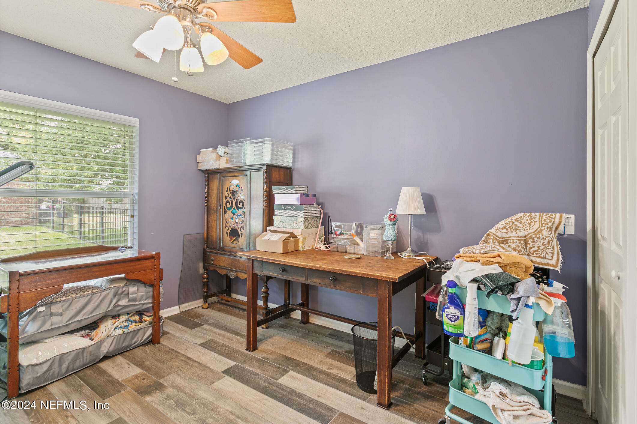 1658 Lockend Road Jacksonville, FL 32221 - Photo 33 of 54 a view of a workspace with furniture and a window