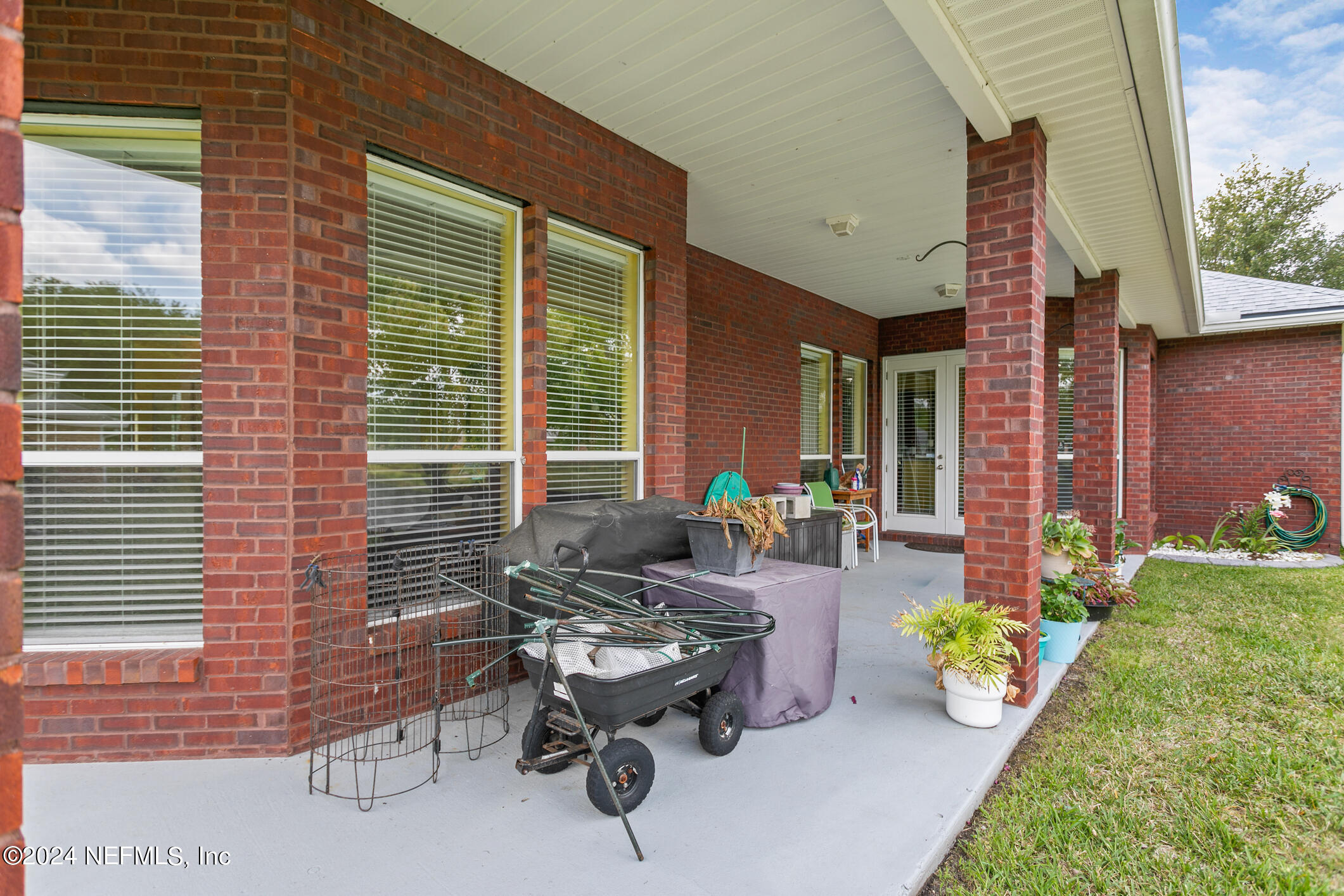 1658 Lockend Road Jacksonville, FL 32221 - Photo 39 of 54 a backyard of a house with outdoor seating