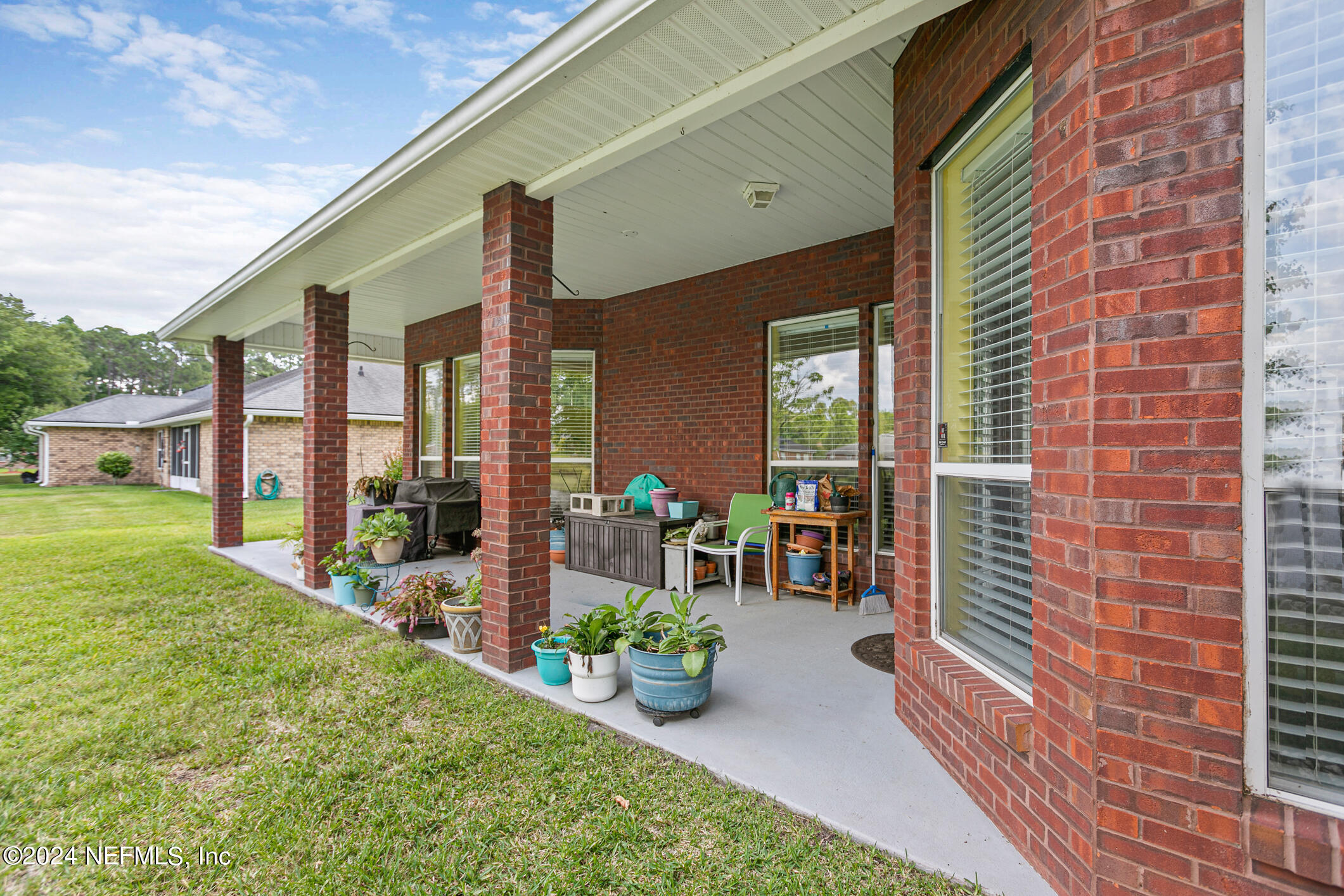 1658 Lockend Road Jacksonville, FL 32221 - Photo 40 of 54 a view of a porch with chairs