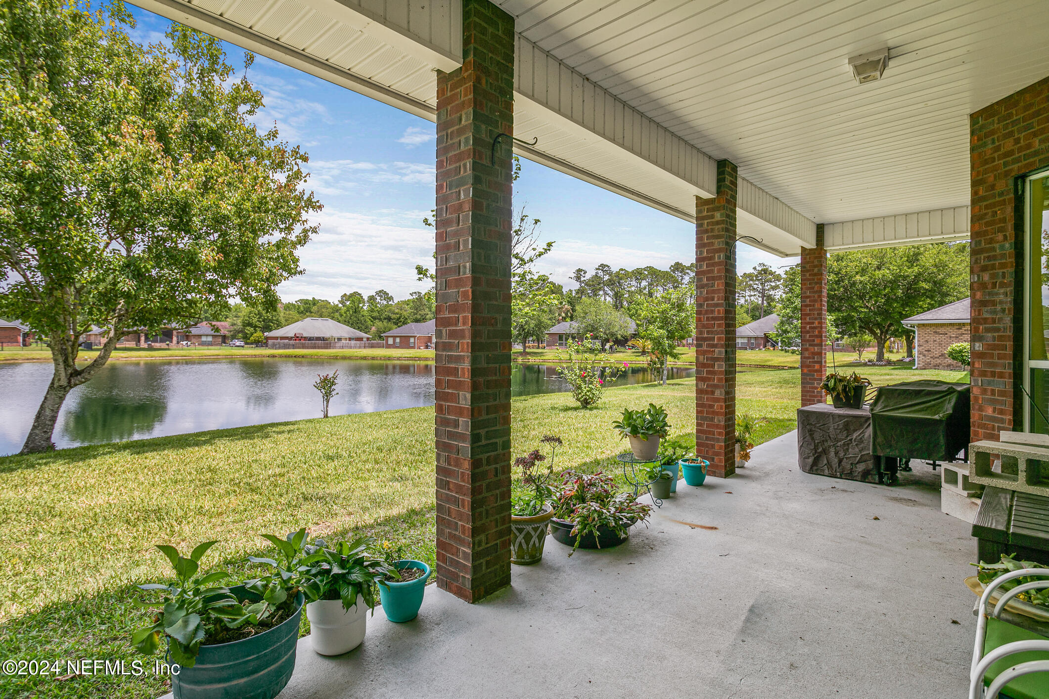 1658 Lockend Road Jacksonville, FL 32221 - Photo 41 of 54 a view of a garden from a living room
