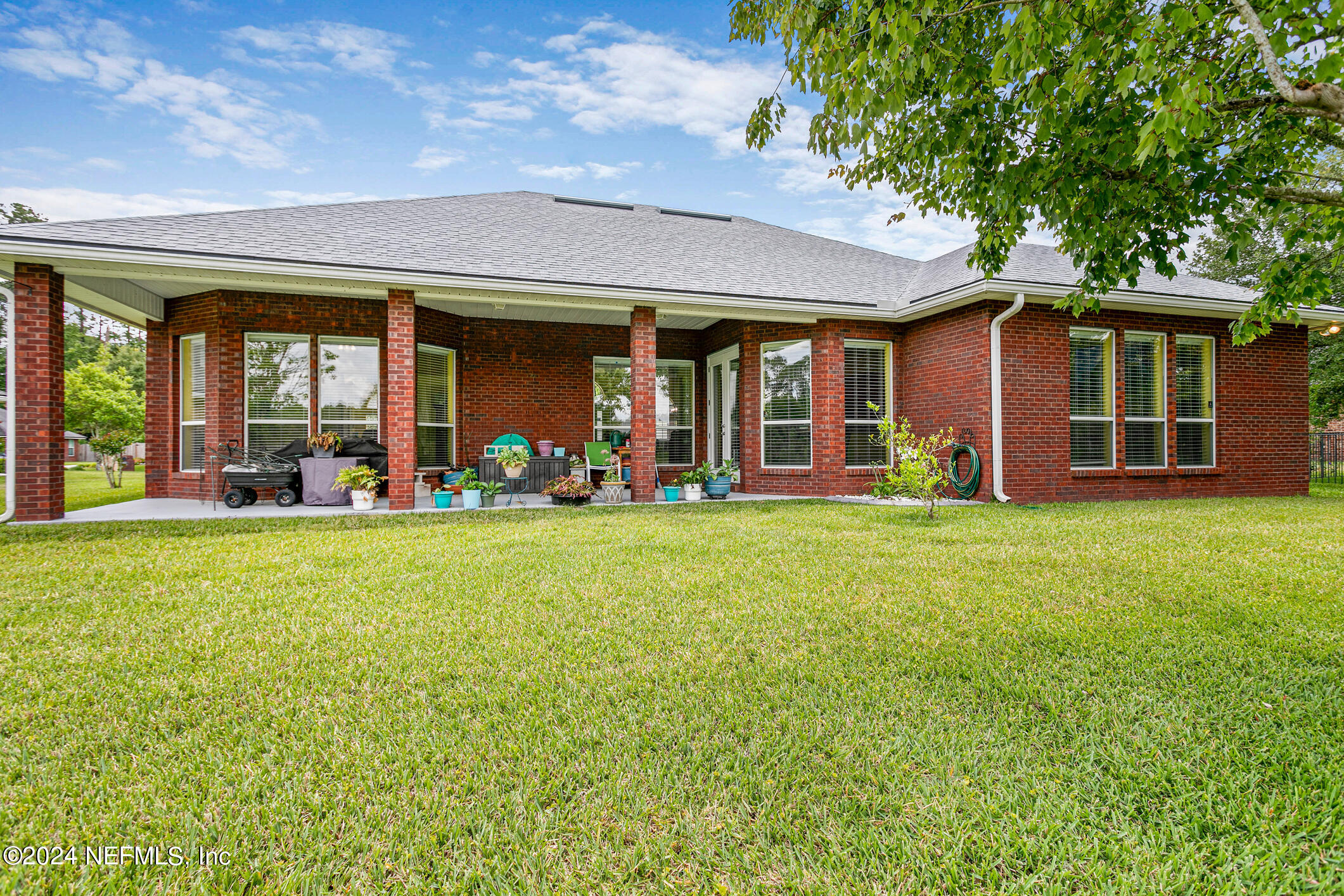 1658 Lockend Road Jacksonville, FL 32221 - Photo 48 of 54 a front view of a house with garden