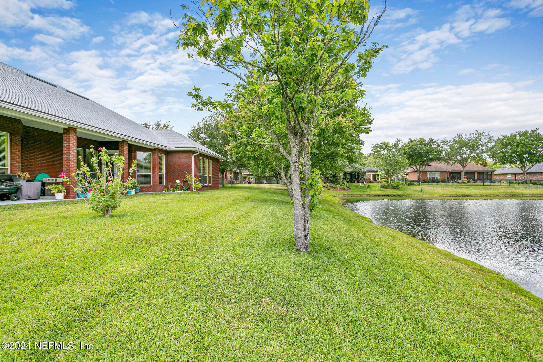 1658 Lockend Road Jacksonville, FL 32221 - Photo 49 of 54 a house view with swimming pool and garden space
