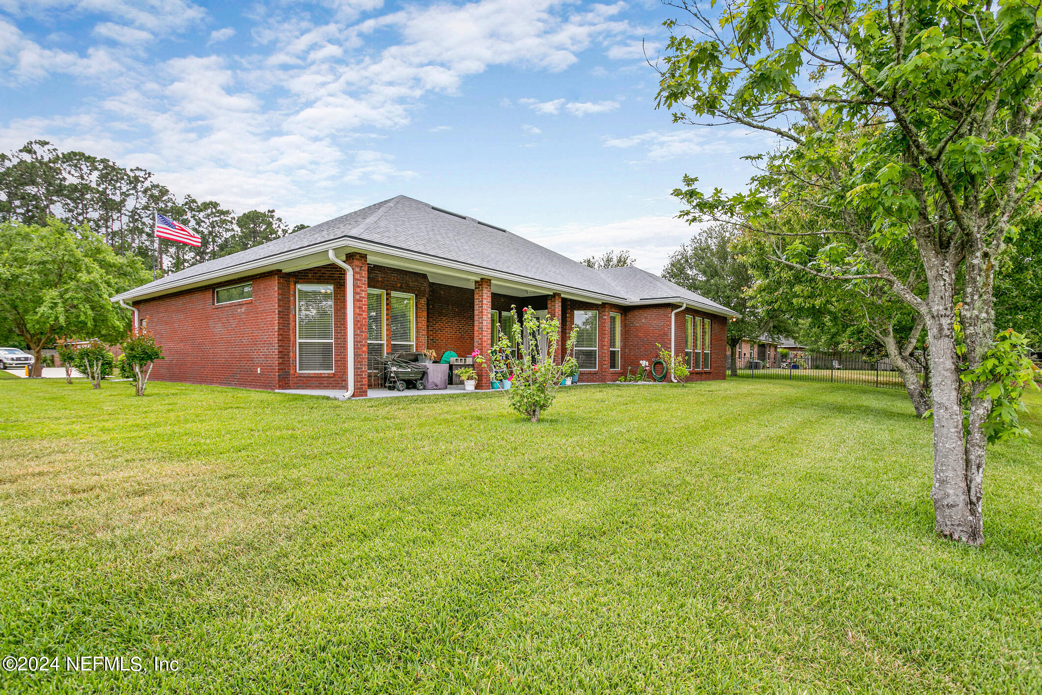1658 Lockend Road Jacksonville, FL 32221 - Photo 50 of 54 a front view of house with yard and green space