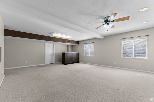1417 Blacksmith Lane Draper, UT 84020 - Photo 25 of 57 Spacious room featuring light-colored carpeting and neutral wall tones