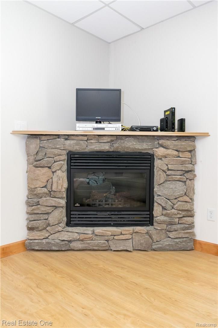 871 Heights Road Lake Orion, MI 48362 - Photo 30 of 38 Beautiful gas lower level fireplace
