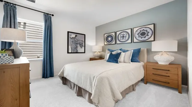 a bathroom with a granite countertop toilet sink and bathtub