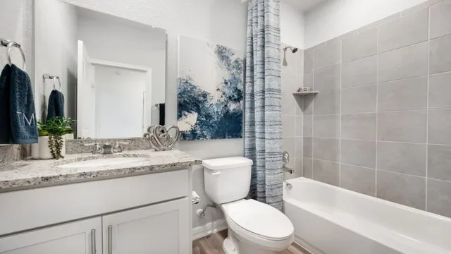 an aerial view of a house with outdoor space