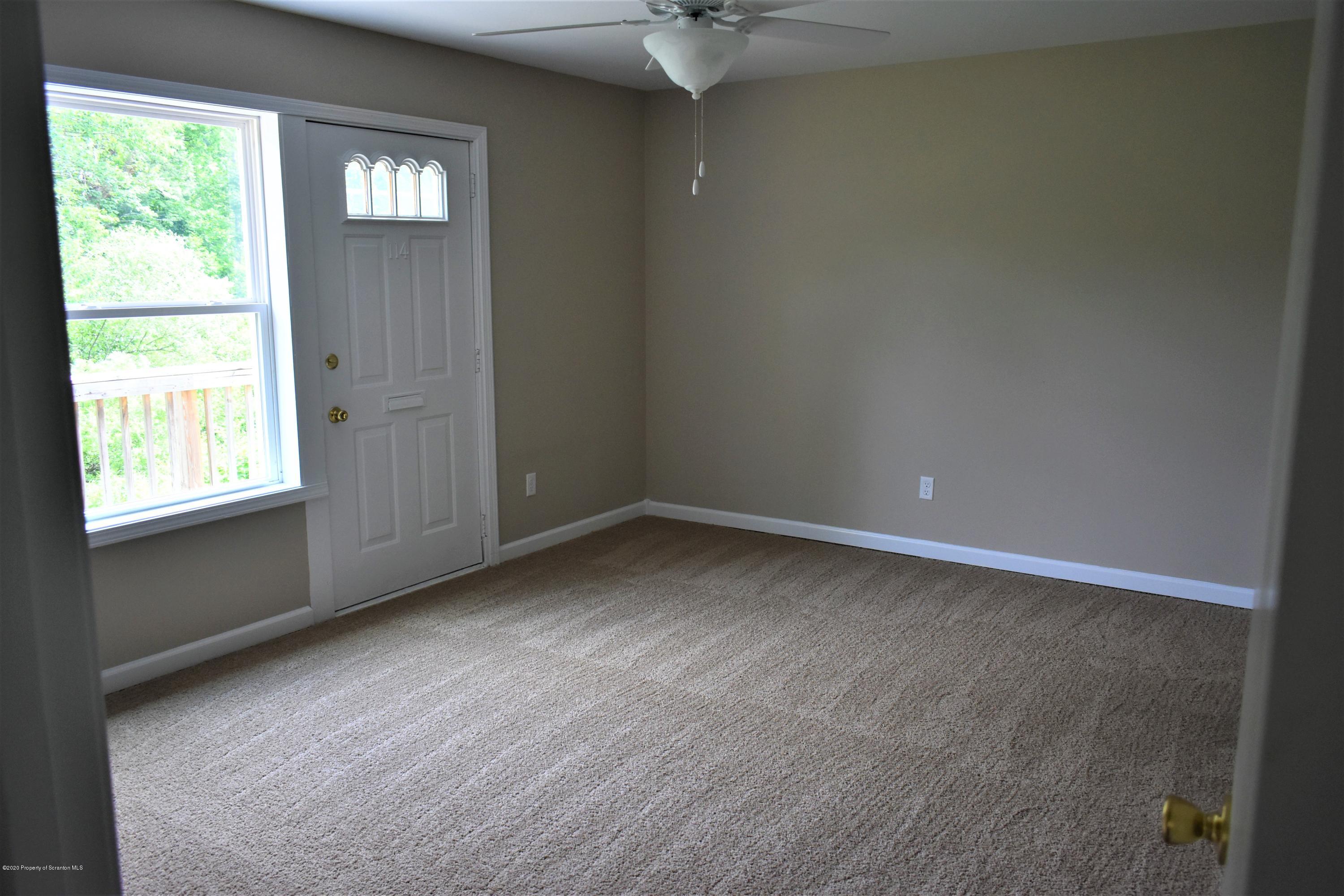 1597 Mt Cobb Road Lake Ariel, PA 18436 - Photo 12 of 28 an empty room with windows