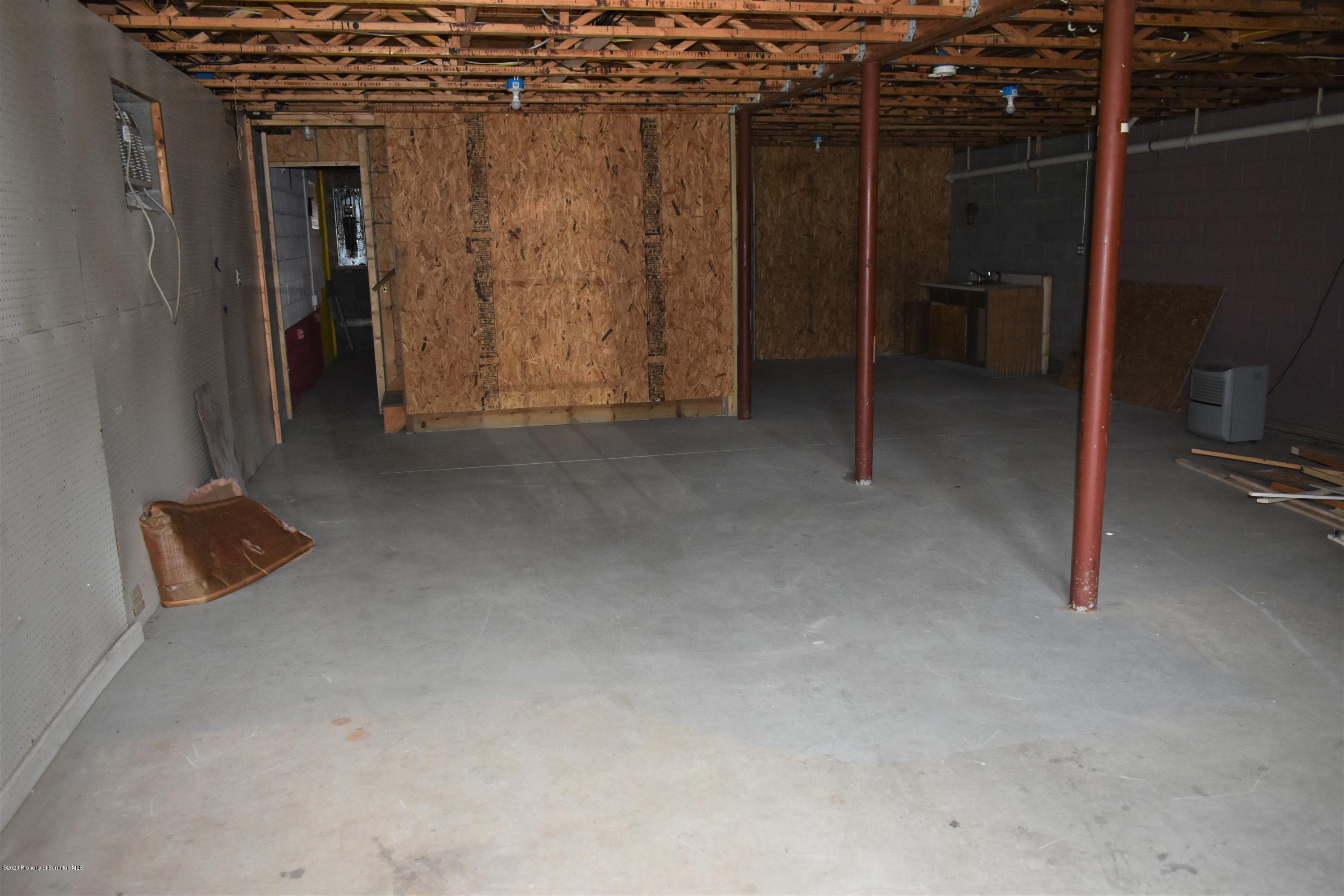 1597 Mt Cobb Road Lake Ariel, PA 18436 - Photo 17 of 28 a view of a room with a refrigerator