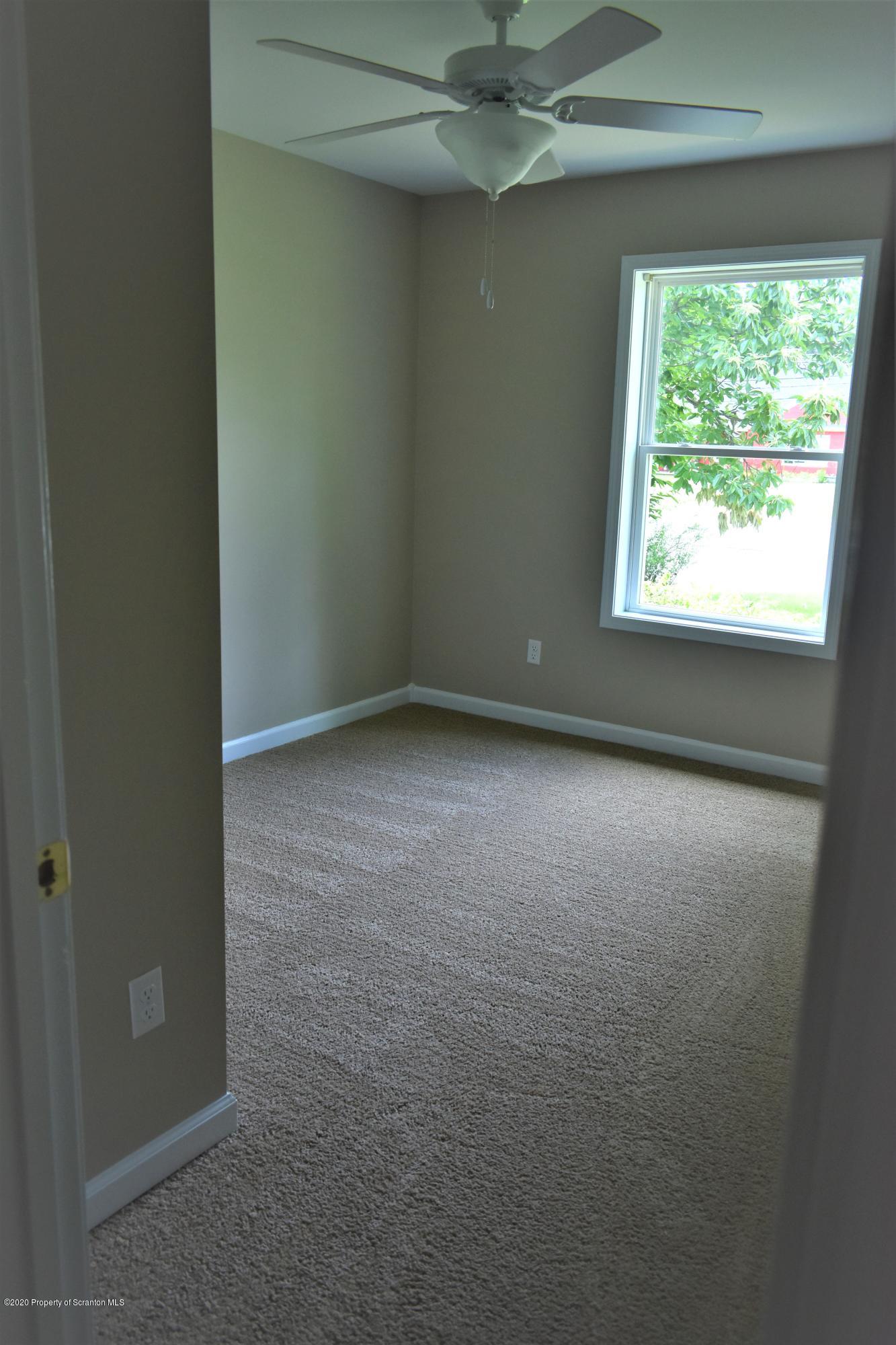 1597 Mt Cobb Road Lake Ariel, PA 18436 - Photo 10 of 28 an empty room with a window