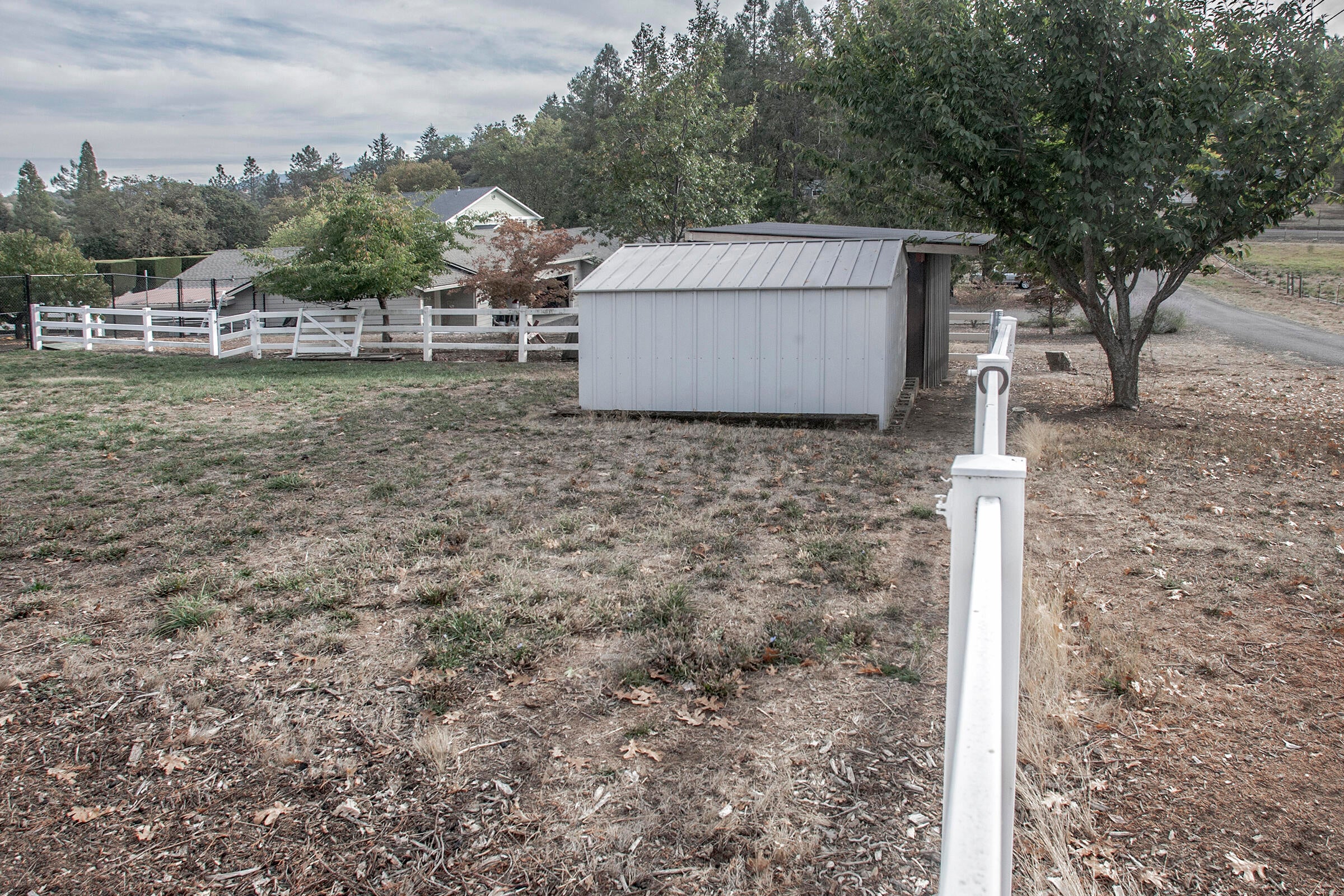 6554 Pioneer Road Medford, OR 97501 - Photo 44 of 50 Front fence line--2 outbuildings