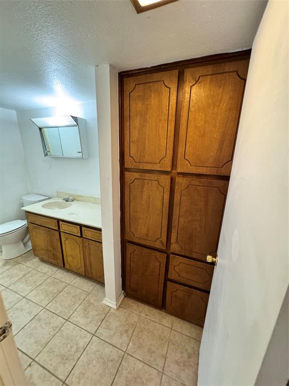 2703 Southside Drive Brownwood, TX 76801 - Photo 7 of 14 a view of a refrigerator in kitchen and a sink