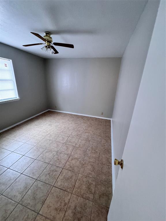 2703 Southside Drive Brownwood, TX 76801 - Photo 8 of 14 a view of an empty room with a window