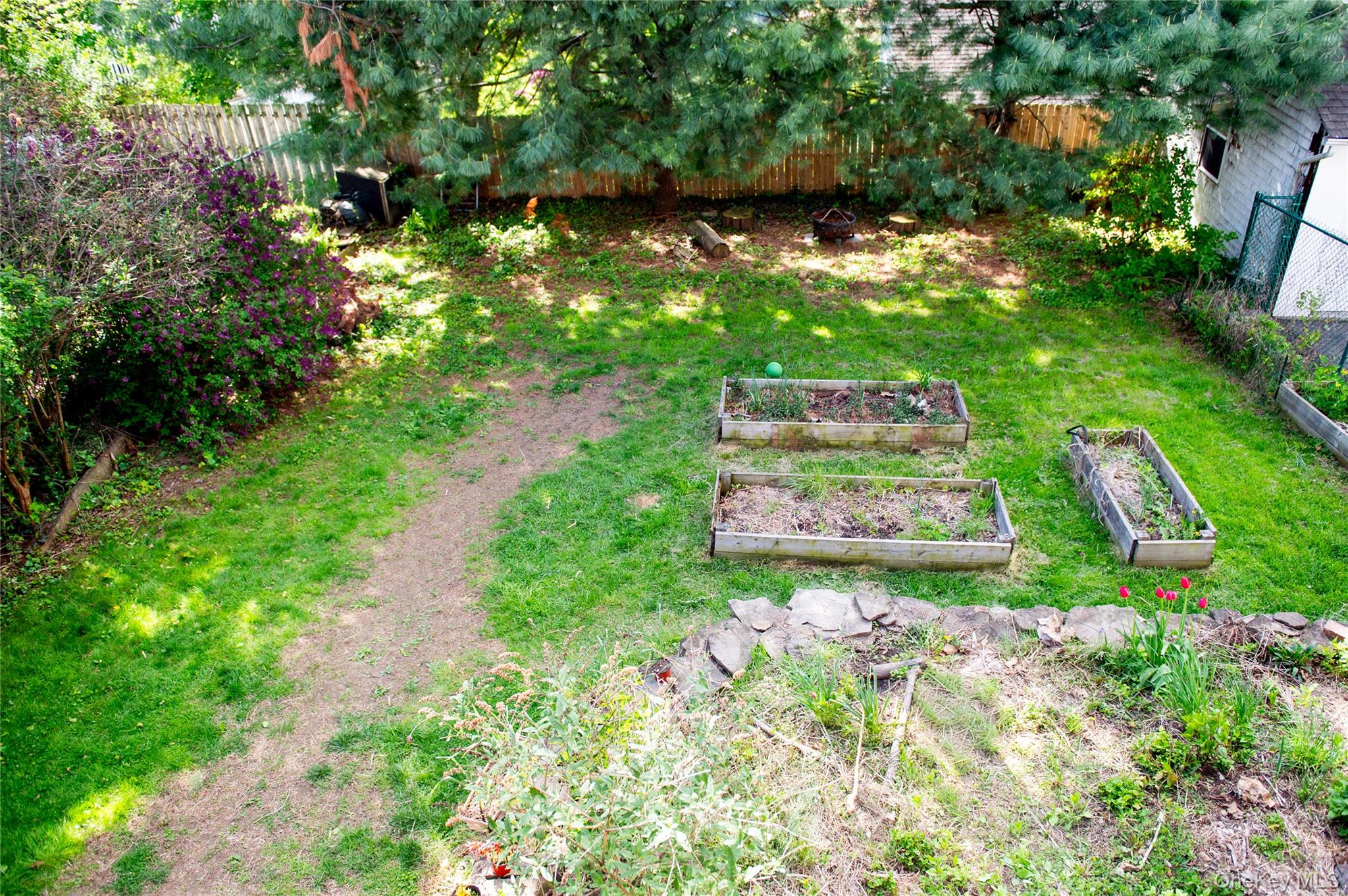 350 Smith Street Peekskill, NY 10566 - Photo 32 of 32 a view of a garden with a lake
