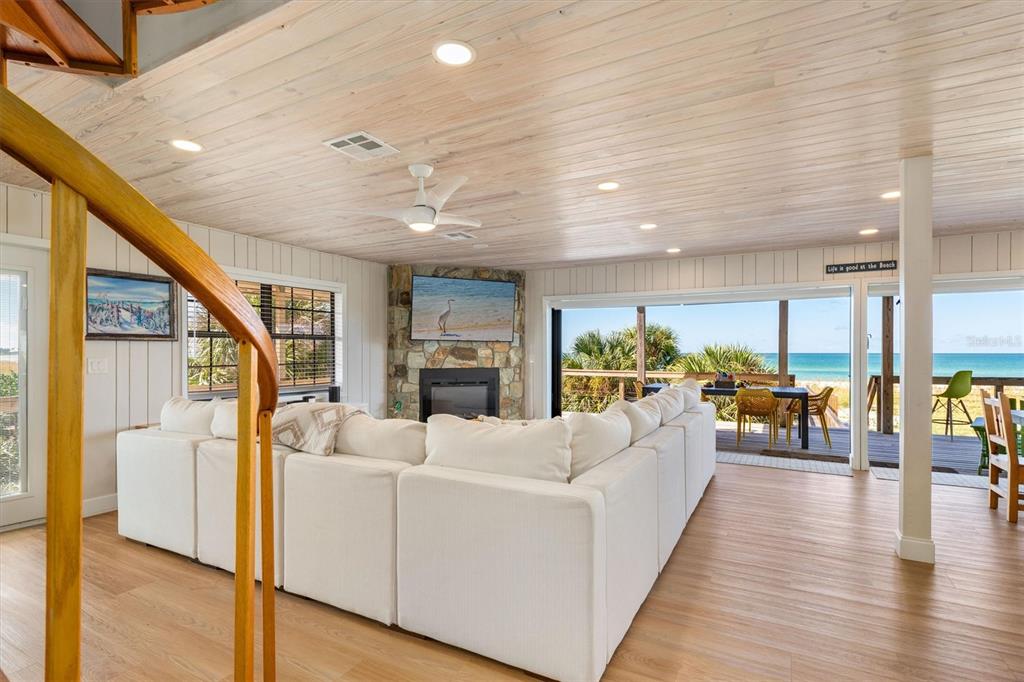 9498 Alborado Road Boca Grande, FL 33921 - Photo 16 of 81 a living room with furniture and wooden floor