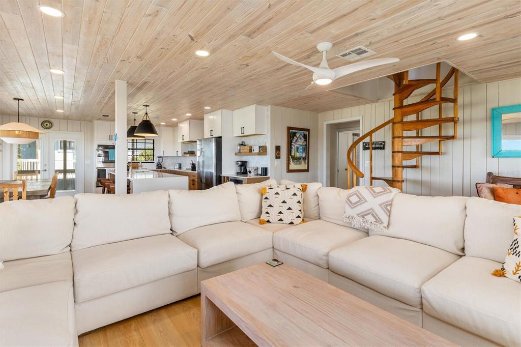 9498 Alborado Road Boca Grande, FL 33921 - Photo 17 of 81 a living room with furniture and a large window