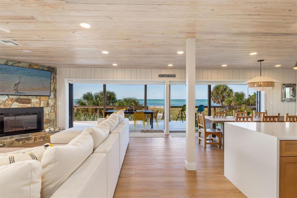 9498 Alborado Road Boca Grande, FL 33921 - Photo 18 of 81 a living room with furniture and a flat screen tv