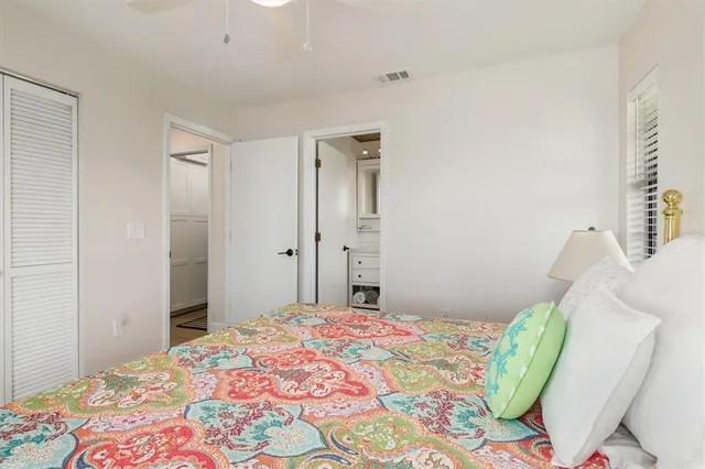 a view of a deck with couches chairs with wooden floor