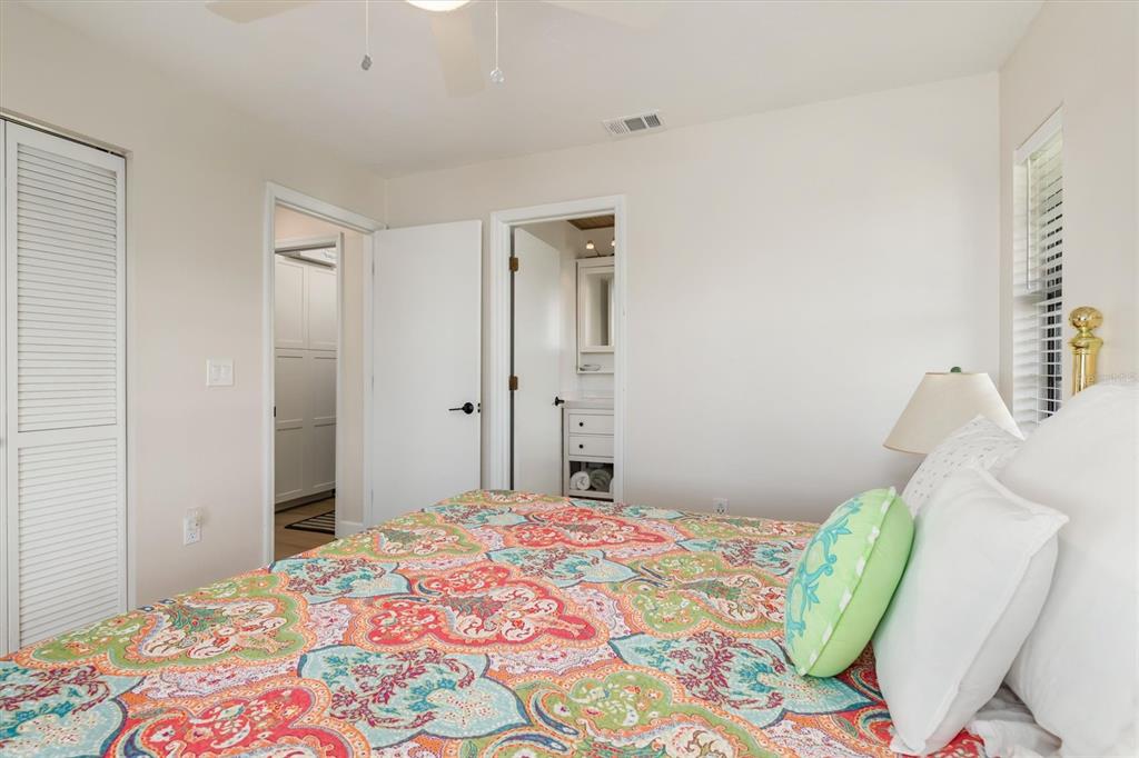 9498 Alborado Road Boca Grande, FL 33921 - Photo 35 of 81 a bedroom with a bed and a dresser