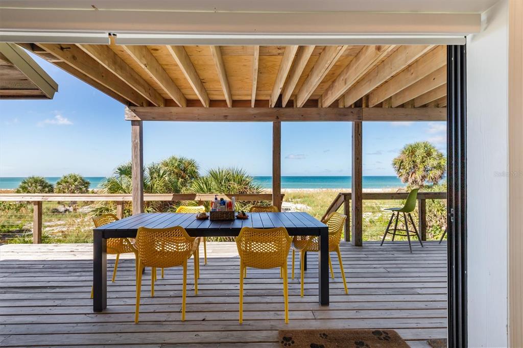 9498 Alborado Road Boca Grande, FL 33921 - Photo 40 of 81 a view of swimming pool with outdoor seating