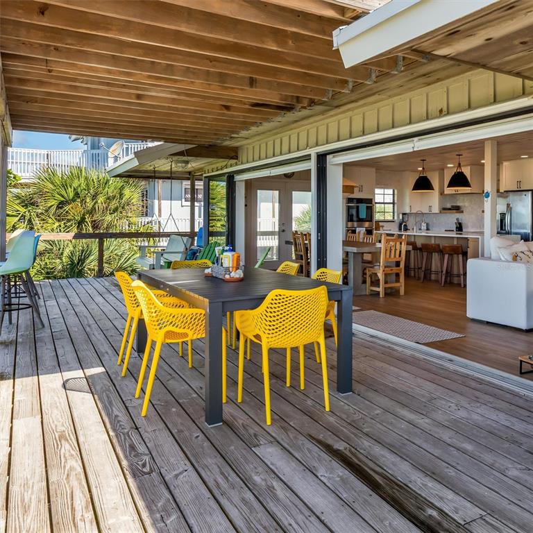 9498 Alborado Road Boca Grande, FL 33921 - Photo 50 of 81 a view of a swimming pool with outdoor seating