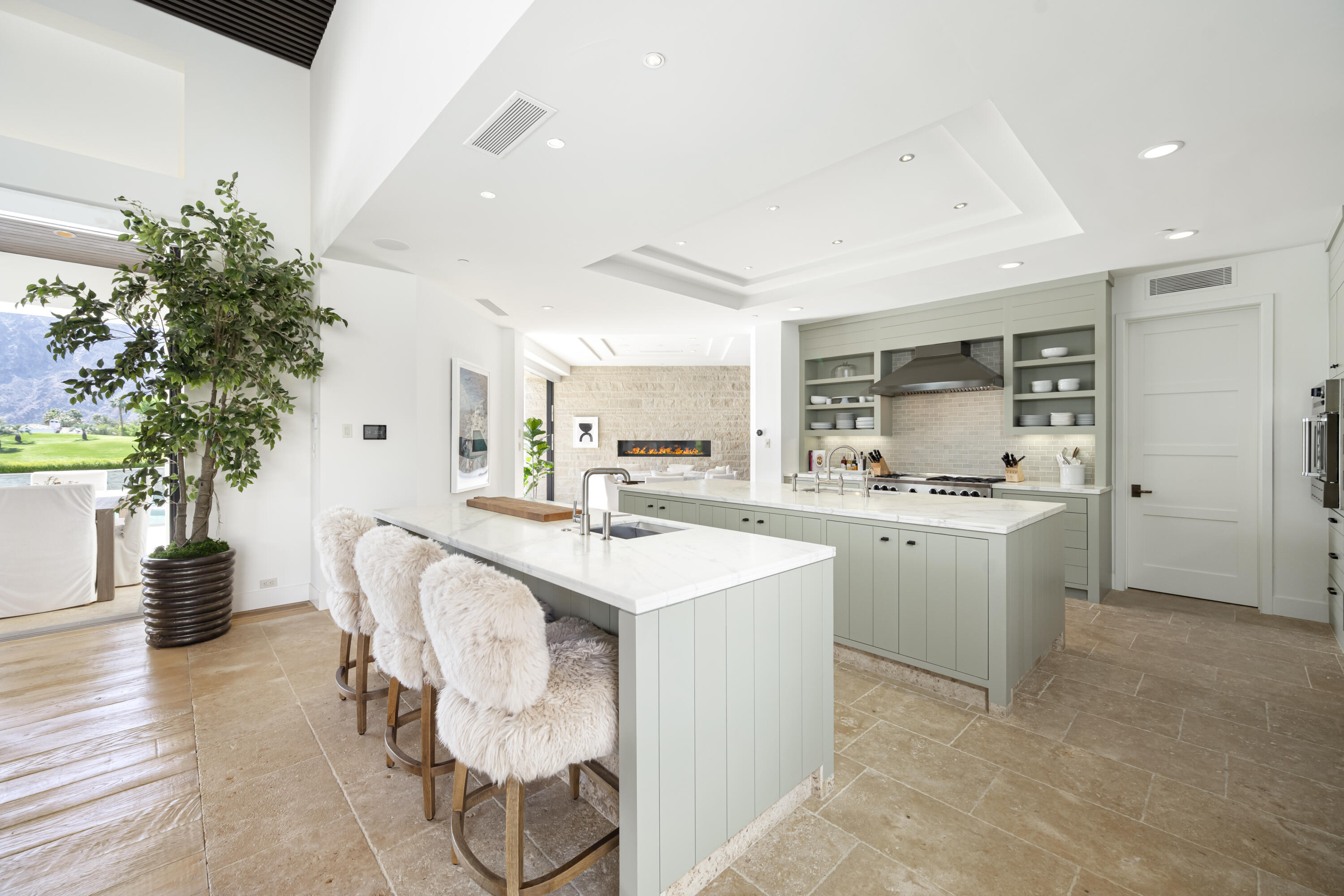 53615 Via Strada La Quinta, CA 92253 - Photo 13 of 52 a kitchen with a sink and stove