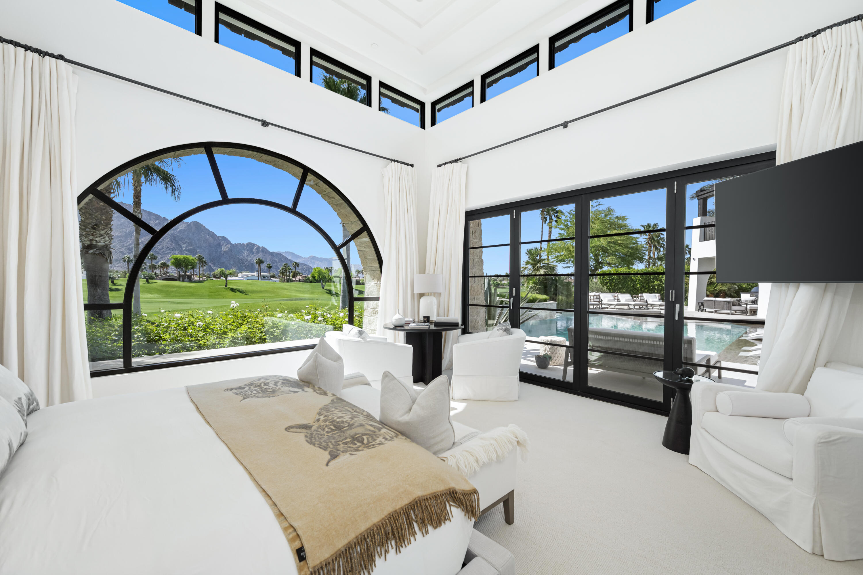 53615 Via Strada La Quinta, CA 92253 - Photo 20 of 52 a view of an entryway with a floor to ceiling window