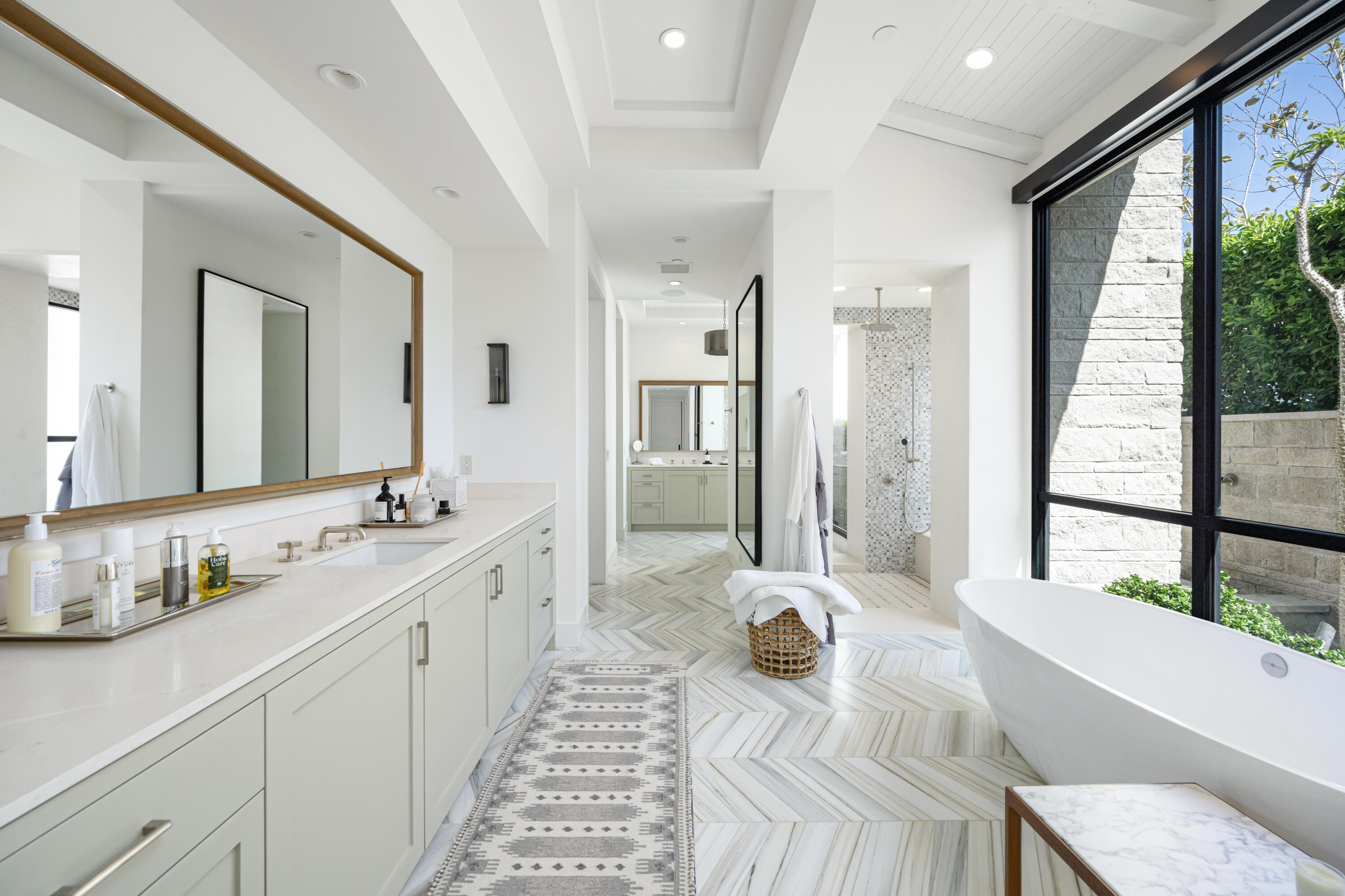 53615 Via Strada La Quinta, CA 92253 - Photo 21 of 52 a spacious bathroom with a double vanity sink and a mirror