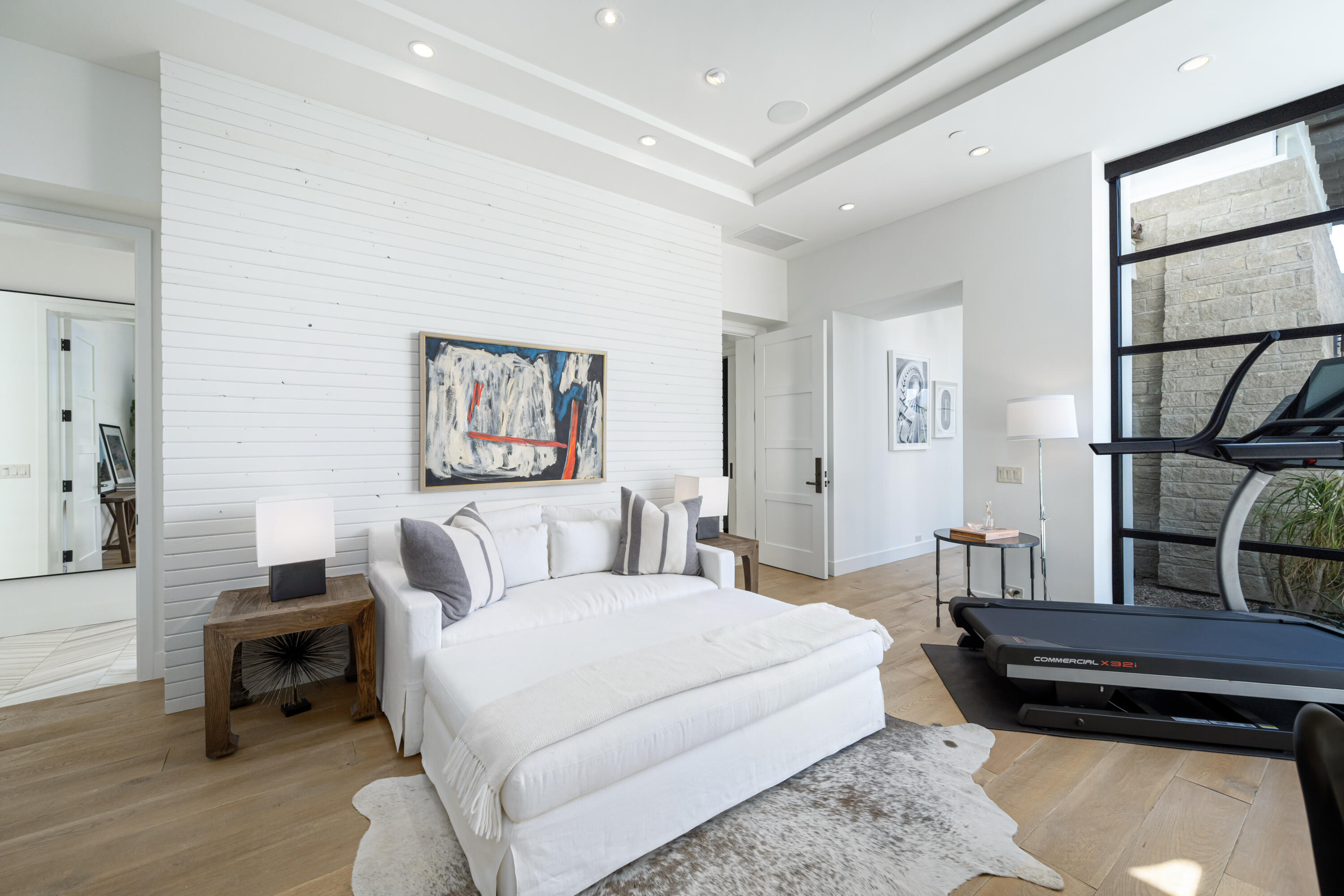 53615 Via Strada La Quinta, CA 92253 - Photo 23 of 52 a bedroom with a bed a couch and large window