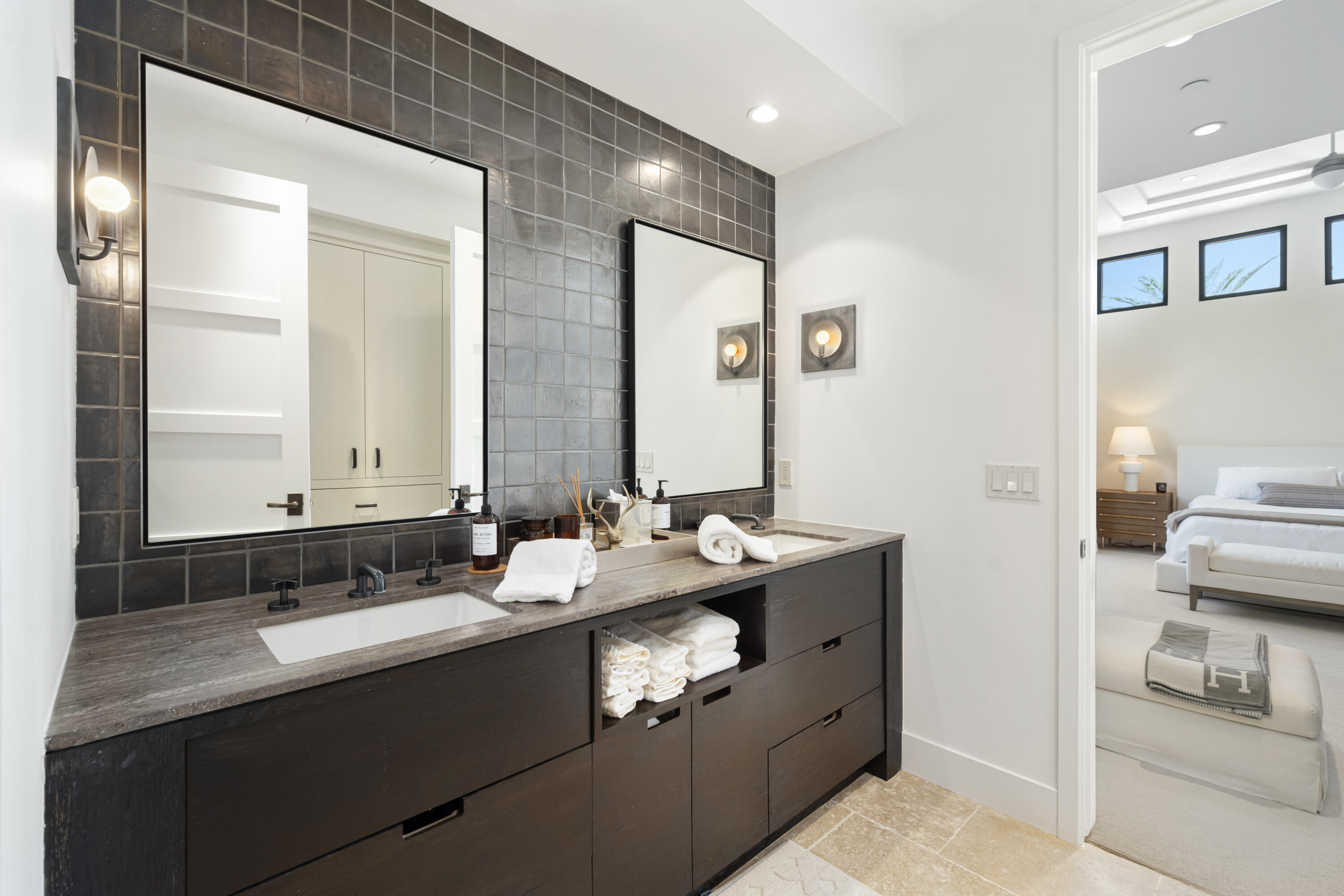 53615 Via Strada La Quinta, CA 92253 - Photo 28 of 52 a bathroom with a sink and a mirror