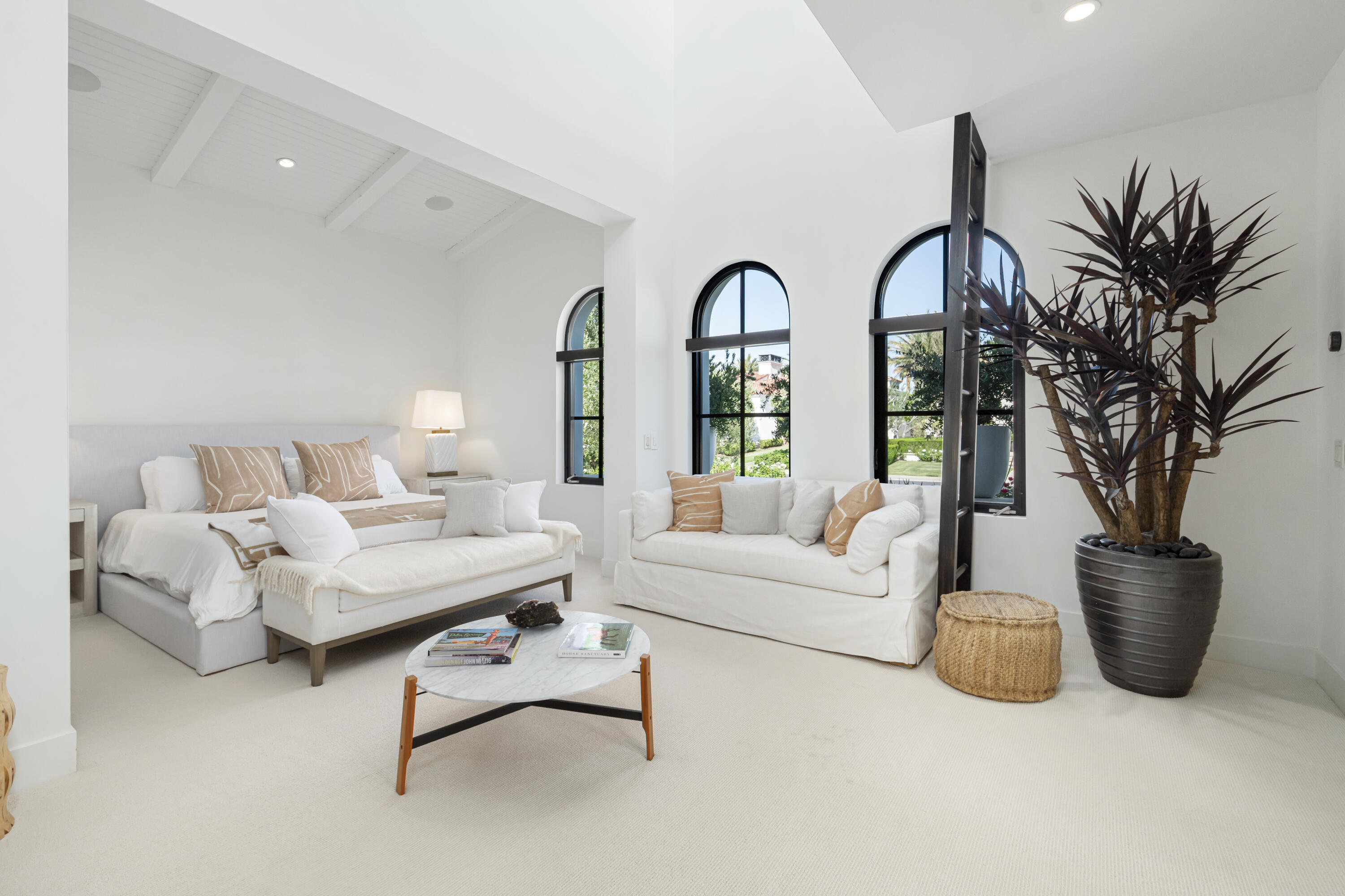 53615 Via Strada La Quinta, CA 92253 - Photo 29 of 52 a living room with furniture and a potted plant