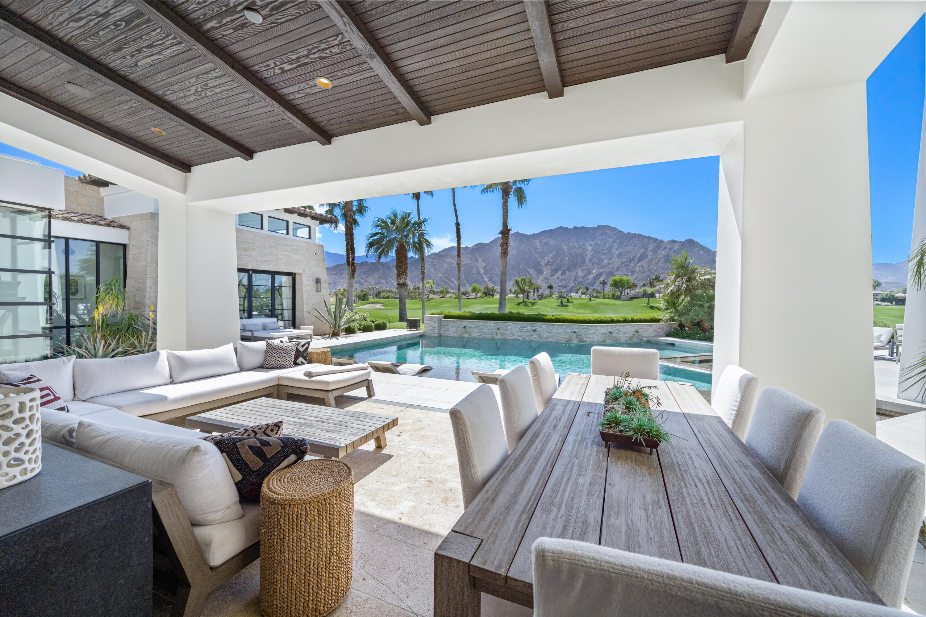 53615 Via Strada La Quinta, CA 92253 - Photo 40 of 52 a view of a patio with couches table and chairs