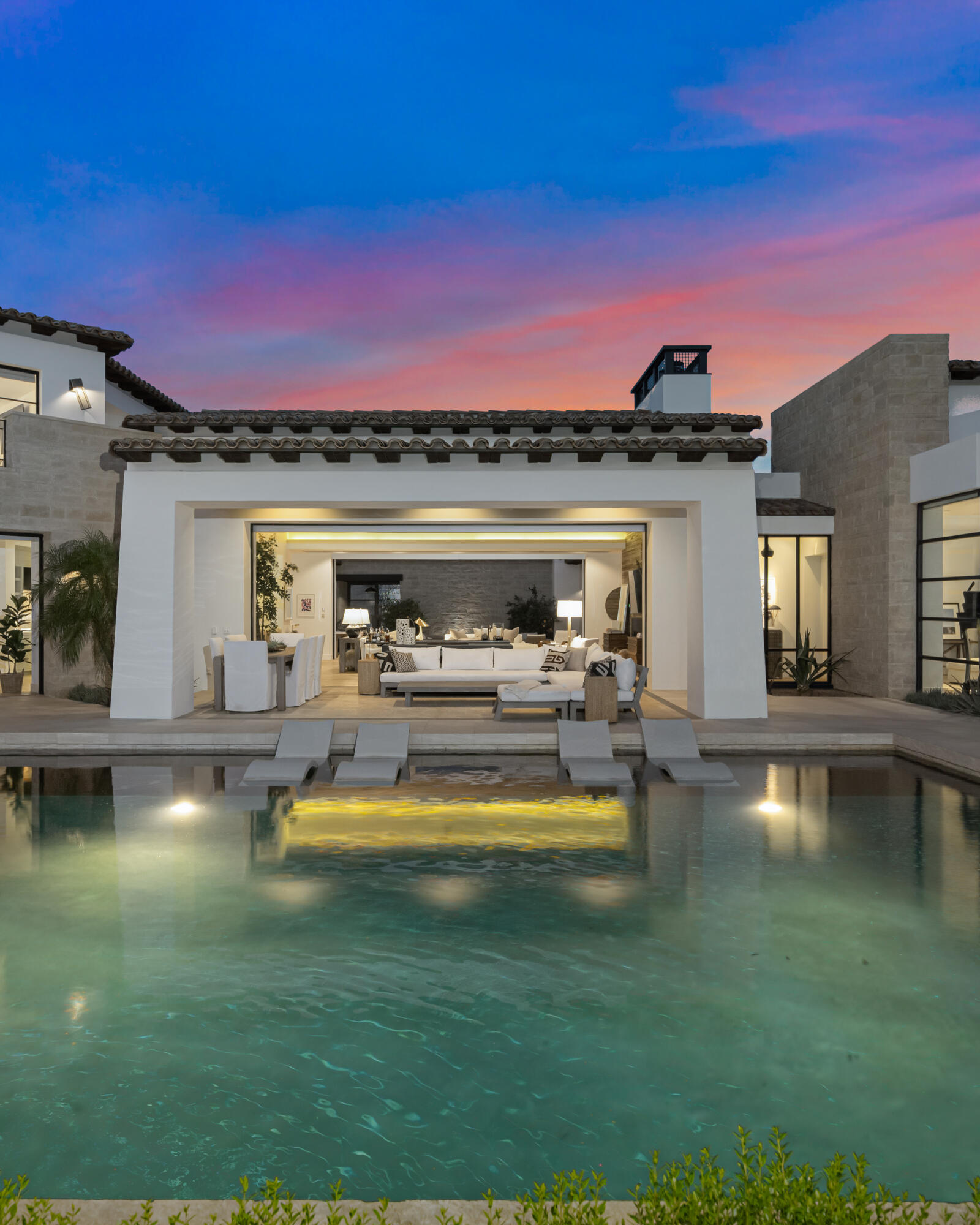 53615 Via Strada La Quinta, CA 92253 - Photo 44 of 52 a view of a swimming pool with a table and chairs