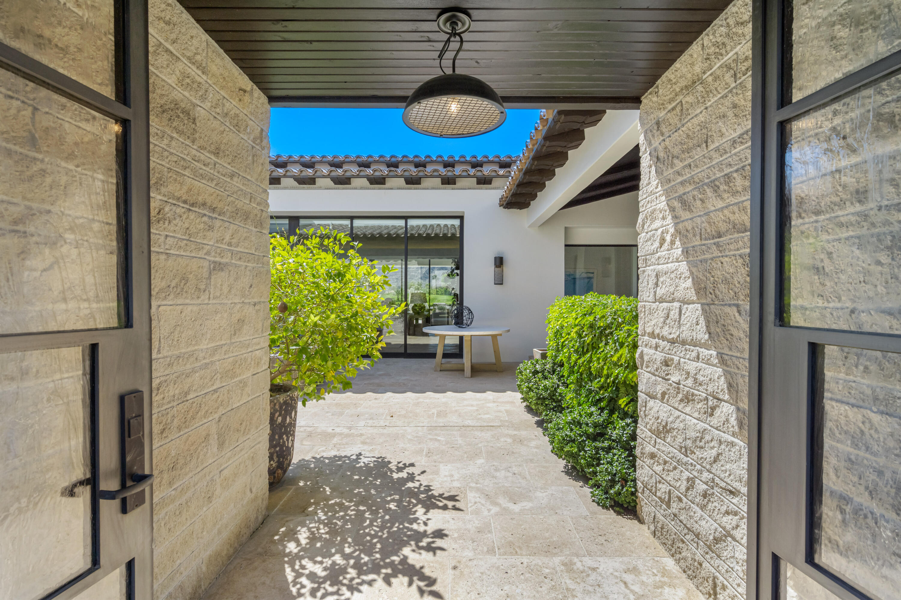 53615 Via Strada La Quinta, CA 92253 - Photo 6 of 52 a front view of a house with garden