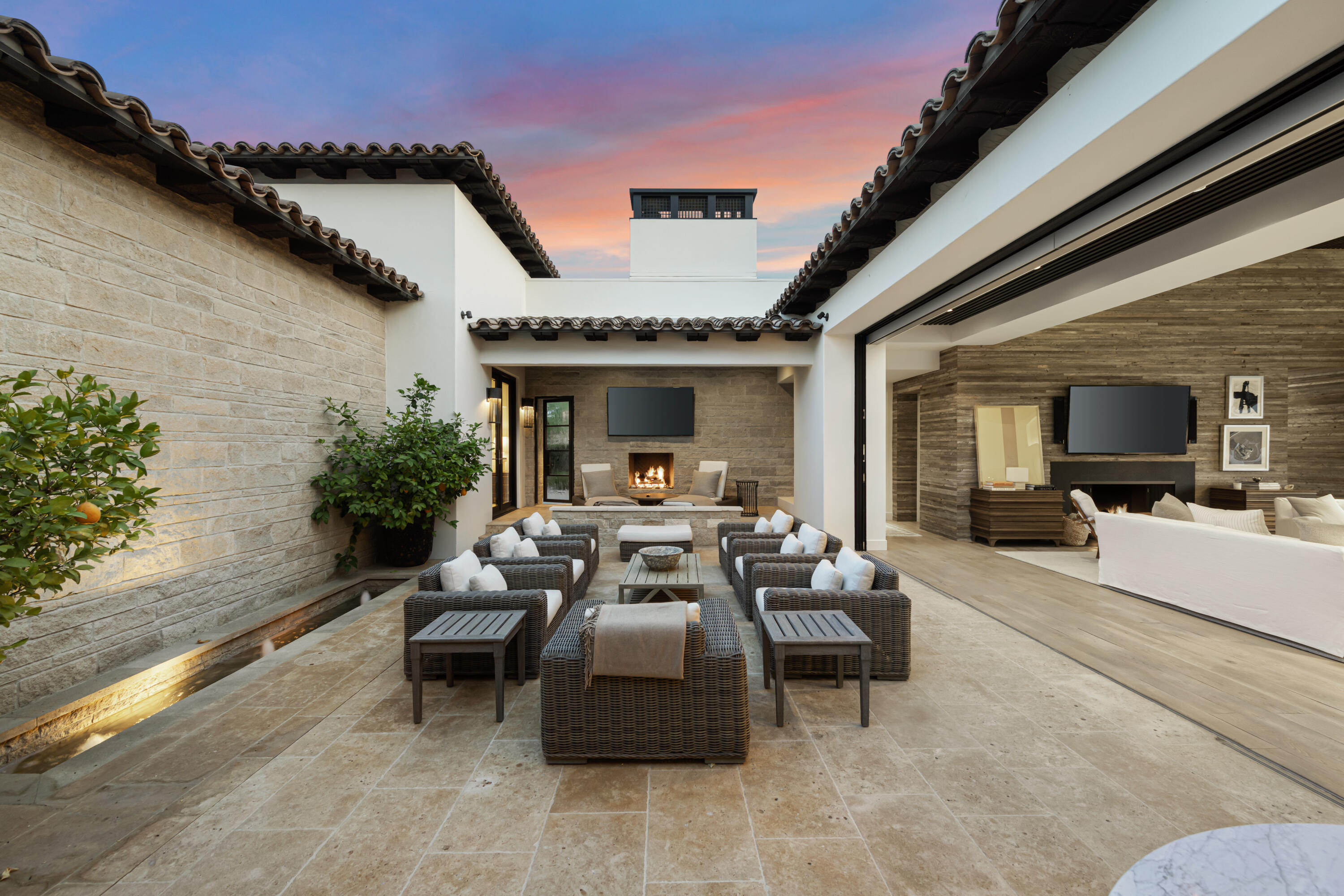 53615 Via Strada La Quinta, CA 92253 - Photo 7 of 52 a view of a patio with table and chairs potted plants with wooden floor