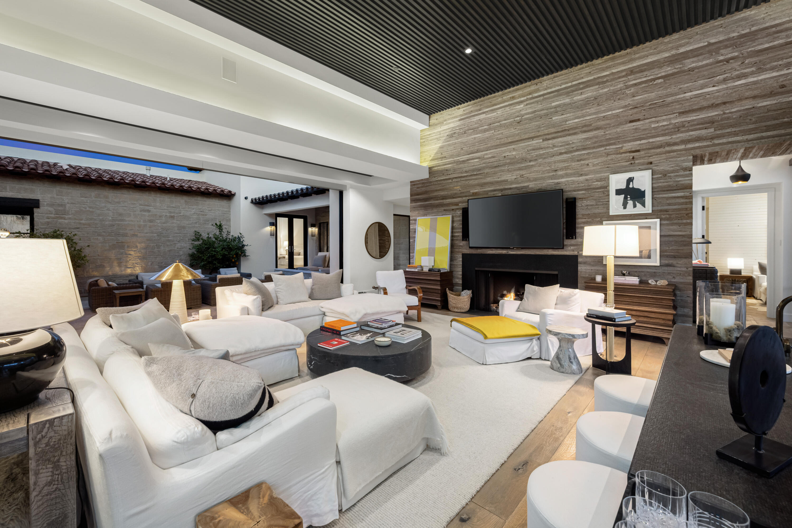 53615 Via Strada La Quinta, CA 92253 - Photo 10 of 52 a living room with furniture fireplace and a television