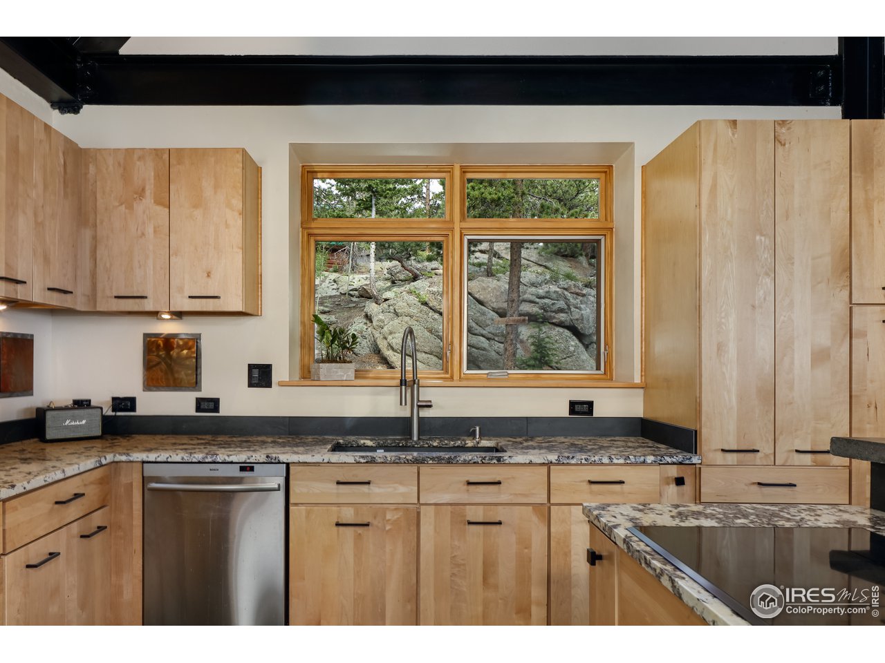 116 Ramona Road Golden, CO 80403 - Photo 14 of 40 a kitchen with sink and large window