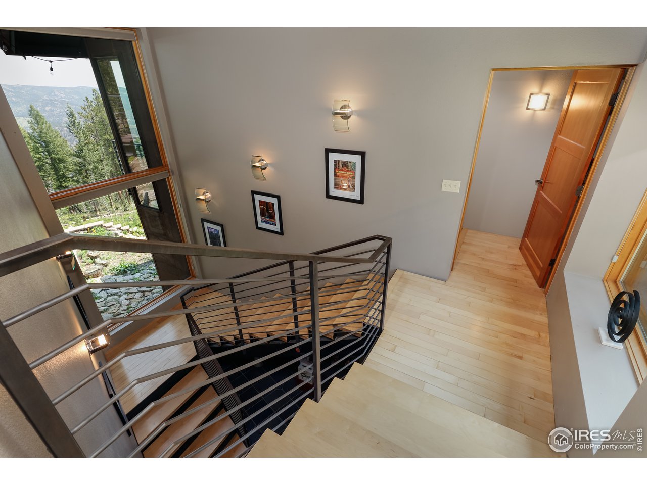 116 Ramona Road Golden, CO 80403 - Photo 24 of 40 a view of an entryway with wooden floor