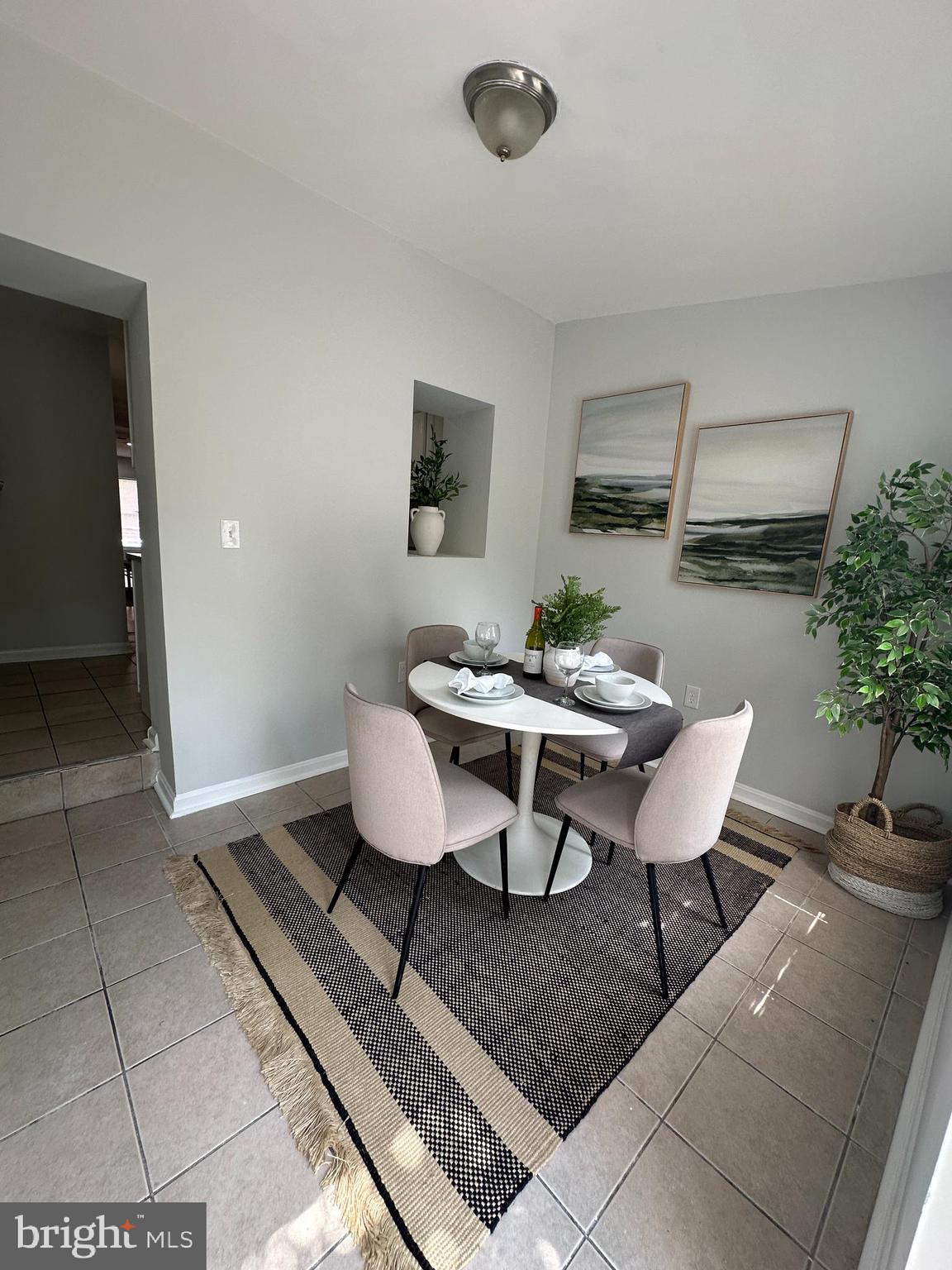 1127 Sargeant Street Baltimore, MD 21223 - Photo 18 of 34 a dining room with furniture and window