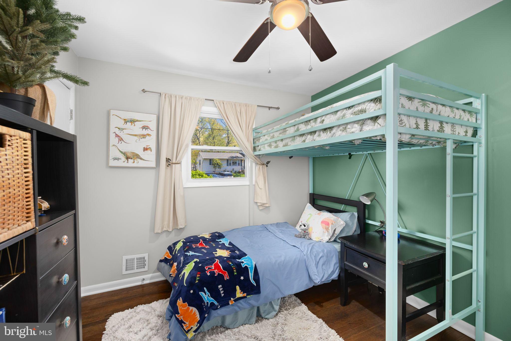6502 Haystack Road Alexandria, VA 22310 - Photo 15 of 30 a bedroom with a bed and a window
